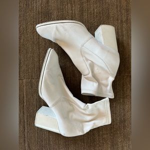 Intentionally blank white booties